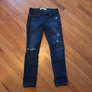 Dark denim slightly ripped jeans